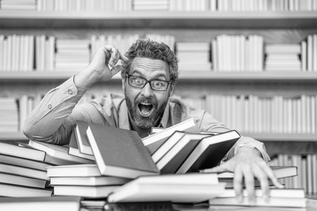 school teacher reading books getting knowledge and education at teachers dayの写真素材