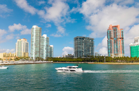 Yacht cruising near Miami Beach. Aerial view of boats on turquoise waters in Miami. Yacht retreat in Miami.の写真素材