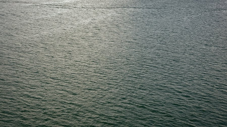 Sea water surface. Ripple water of ocean. Aquamarine ocean nature. Background of clear turquoise sea water. Idyllic summer vacation. Aerial view. Rippled surfaceの写真素材