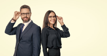 Business vision and eyesight. Vision of success. Successful and confident businesspeople in suit. Business man and woman in glasses. Businesspeople look through eyeglasses. Copy space bannerの写真素材