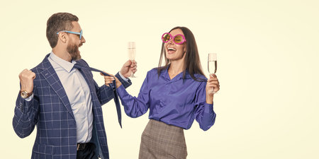 Corporate anniversary party. Business partners celebrating success cheering champagne. Party fun. Businesspeople have fun together in corporate party. Celebrate especial event. Marketing teamの写真素材