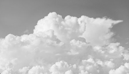 Sky clouds background. Blue sky and white clouds. White cloudy sky with soft sun light. Clouds on pastel blue sky background. Sky Landscape Background. Sky Clouds Wallpaper.の写真素材