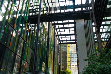 Glass exterior background. Architecture. Building exterior architecture. Building background. Glass backdrop building. Architectural detail. Background of architecture. Modern glass backgroundの写真素材