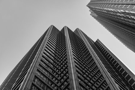 Skyscraper glassy. Modern city perspective. Skyscraper in metropolis city. City downtown with...