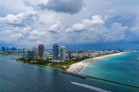 Aerial view of boats on turquoise waters. Yacht retreat. Oceanfront cityscape with sailing vessels.の写真素材