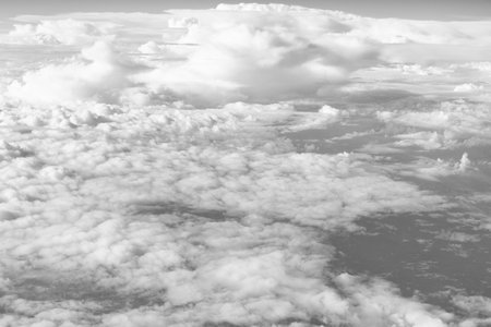 blue sky with a few clouds. The sky is very bright and the clouds are scattered throughout....