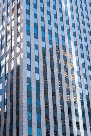 Glass building window. Architectural minimalist. Background of architecture. Modern glass...