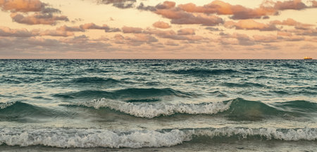 Skyscape with sea horizon. Calm horizon view at sea sunrise. Romantic summer vacation sunrise on...