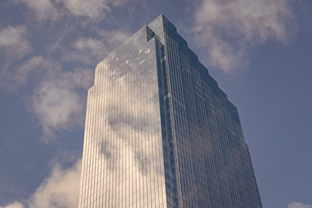 Architectural building in business area. Glass skyscraper. City architecture. Architecture of modern...