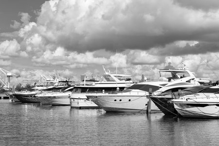 Luxury yacht boat moored at harbor pier in Miami beach summer marina, Florida