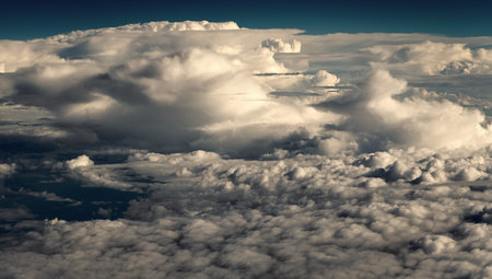 Sky clouds background. Air clouds in the blue sky. blue sky backdrop with the clouds. Sky Clouds Wallpaper.の写真素材