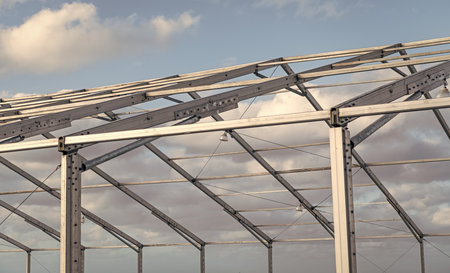 Architectural detail. Installation of metal structure outside. Metal construction. Structural design...