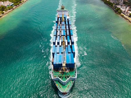 Aerial cargo ship with container. Cargo business. Container ship. Shipping logistics. Commercial...