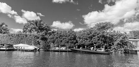 Luxury boat motor yacht in marina. Luxury yacht. Boating and yachting tourism. Luxurious lifestyle. Vacation on summer. Docked yacht at private area. Sea vacation on summer. Private dockの写真素材