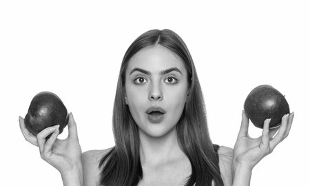 Apple detox. Healthy lifestyle diet. Caucasian woman biting fresh apple isolated on white. Healthy food vitamin. Natural organic products. Skincare and diet. Young woman dieting.の写真素材