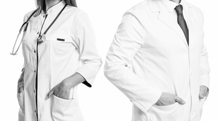 doctor with stethoscope isolated on white. professional physician in coat with medical woman. medicine and healthcare. doctor at hospital. two doctor in medical practice. Complementary practitionerの写真素材