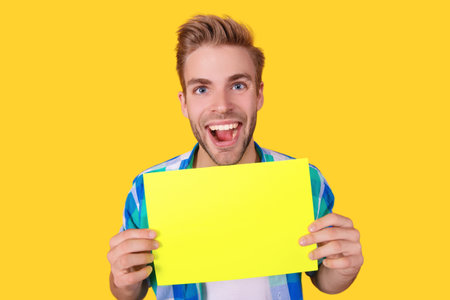 Shopping sale and discount. Presenting product. Man with paper banner. Promotion and presenting. Man...