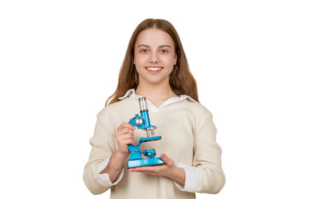 Student of biology. Back to school. Teen girl with microscope isolated on white. Biology science for schoolgirl. Microscope research. Future scientist. School biology girl hold microscopeの写真素材