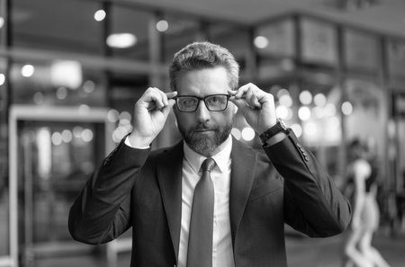 Successful leader businessman in suit. Business man look in glasses. Man has vision to success. Businessman represent leadership. Business vision and success. Vision of success. Look forwardの写真素材