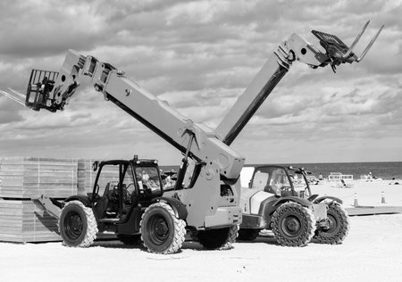 Telescopic Boom Lift. Boom lift outdoor. Machine equipment. Heavy crane equipment. Boom lifting machinery. Lift machine crane for building siteの写真素材