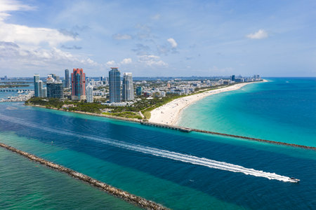Aerial view of boats on turquoise waters. Yacht retreat. Oceanfront cityscape with sailing vessels. Relaxing vacation.の写真素材