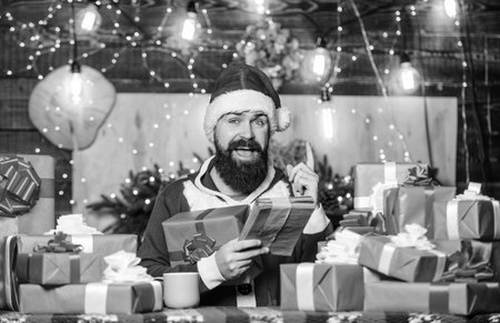 Bright memories. winter shopping sales. Writing wish list. bearded man santa. Greetings to relatives. bearded santa deliver gifts by address. christmas gift delivery. happy new year. Xmas giftsの写真素材