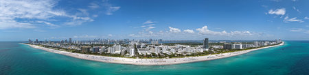 Aerial panorama of Miami Beach coastline. Stunning Miami skyline panorama. Drone panoramic view of Ocean Drive and Art Deco. Downtown Miami waterfront cityscape. South Beach panorama.の写真素材