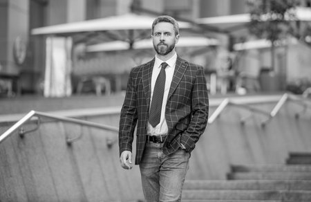 Successful business. Successful business man in American street. Man lawyer. Businessman walking in city. Businessman in suit. Confident businessman outdoor. Business CEO. Man employee of successの写真素材