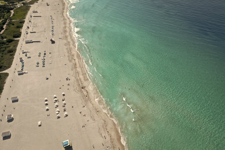 Beach vacation at sea in summer. Sea relax under beach umbrella. Travel to sea. Aerial top view of...