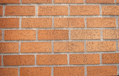 Brick masonry background. Building material concept. Surface of brickwall. Textured brown backdrop. Wall texture background. Brick wall structureの写真素材