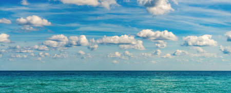 Sea sunrise on ocean beach. Sunset seascape at summer vacation. Horizon with sea cloudy sky. Calm horizon at sea. Romantic summer vacation seascape. Seascape horizonの写真素材