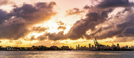 Seascape at summer vacation. Skyscape with sea horizon. Horizon sunrise sea with ship. Sunrise seascape. Romantic summer vacation seascape. Sea sunset horizon. Sunset cloudy skyの写真素材