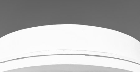 Modern architectural design structure white color and curved shape against blue sky