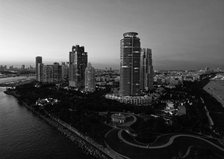 City skyline in evening sunset. Aerial cityscape. Miami South beach at night. Aerial view on skyscraper cityscape at night. Night city aerial view. Luxury skyscraper in Miami, Florida. Sunset viewの写真素材