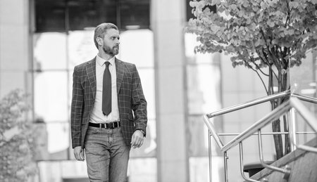 Successful business. Success of entrepreneur. Man banker. Businessman go for meeting. Businessman in suit. Confident businessman outdoor. Business CEO. Man of success. Advertisementの写真素材