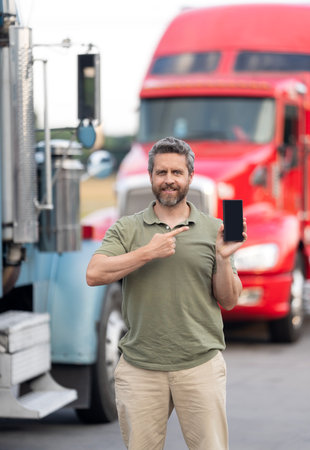 Tracking delivery. Truck driver. Trucking owner planning route. Tech logistics. Hispanic man control...