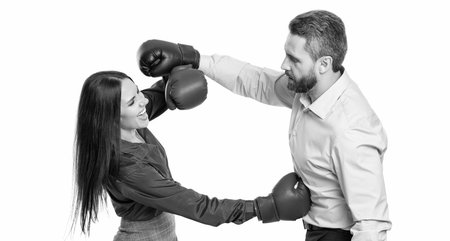 business conflict. businesspeople in boxing gloves isolated on white. businesspeople solving...