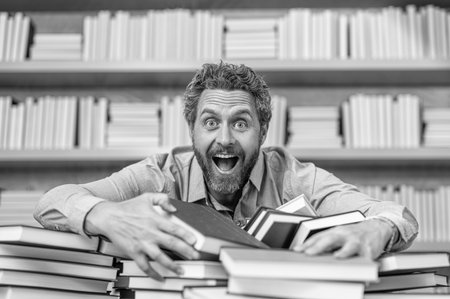 school education for teacher or student. school professor reading books in library. teacher of literature school lesson. teacher in classroom. school classroom full of books. educational literatureの写真素材