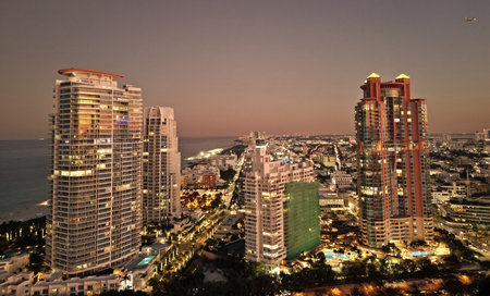 Miami South beach night light. Aerial skyscraper cityscape at night. Night city aerial view. Luxury skyscraper in Miami, Florida. City skyline in evening. Aerial cityscape. Illuminated architectureの写真素材