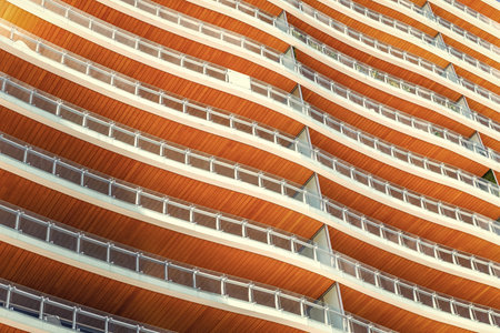 Architecture background. Condominium building balcony. Architectural detail. Background of detailed architecture. Architectural background exterior. Building architecture. Geometric designの写真素材
