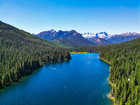 Cooper Lake in Washington. Scenic nature of popular hiking Cooper lake. Cooper lake with mountain...