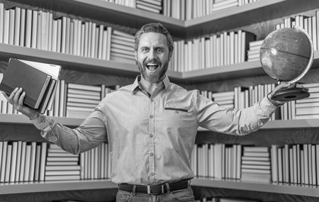 teachers knowledge and skills. teachers day. Teacher in school classroom. Teachers from university exam. Man on lesson in class. Teaching and learning. School education lesson. Geographical contextの写真素材