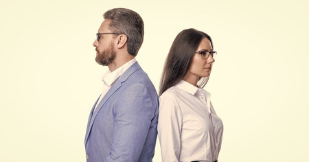 successful businesspeople. business coworkers isolated on white. two businesspeople in formal suit. ambitious businesspeople support. professional business leader with manager. back to backの写真素材