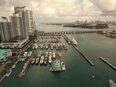 Luxury summer vacation in Miami. Private boat top view. Marina with luxury sea boat. Yacht club marina in Miami. Luxury marina with private yacht and boat. Docked yacht boat in harbor. Quiet marinaの写真素材