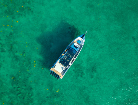 Summer vacation. Luxury yacht boat top view. Panorama aerial view on motorboat. Motor boat yacht floating to marina. Motorboat tour by summer sea. Luxury yacht boat at sea. Yacht cruiseの写真素材