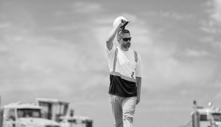 Supervisor civil engineer. Worker at construction site. Builder construction man. Worker with...
