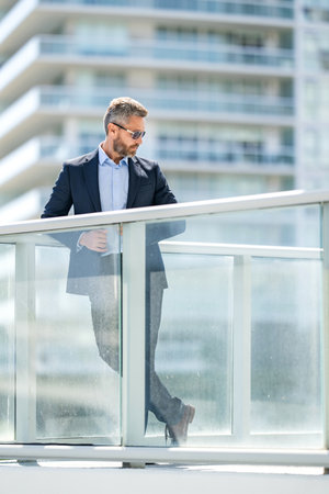 Business boss man. Successful business. Success entrepreneur leadership. Office manager at business break. Successful businessman outdoor. Professional business man wear suit, advertisementの写真素材