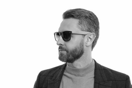Fashion model. Stylish man in menswear isolated on white. Man in business jacket and sunglasses....