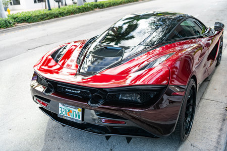 Miami, Florida, USA - February 01, 2025: McLaren 765LT supercar coupe. Luxury red sportscar McLaren 765LT. Car of McLaren 765LT parked outdoor, side viewのeditorial素材