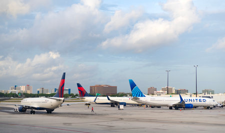 Chicago, Illinois, USA - June 12, 2025: Aviation. Plane arrival of United and Delta airline. Departure and arrival at airport terminal. Airplane terminal. Travel by plane. Airport terminalのeditorial素材